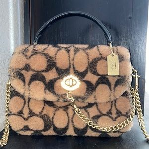 Limited edition, sold out, JENNIFER LOPEZ X COACH collaboration.
